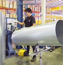 worker rolling duct at Nordfab Asia