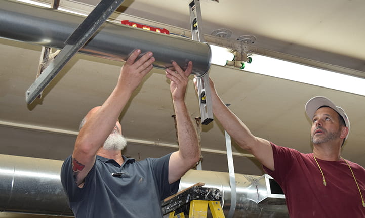 installing Nordfab duct in childrens home