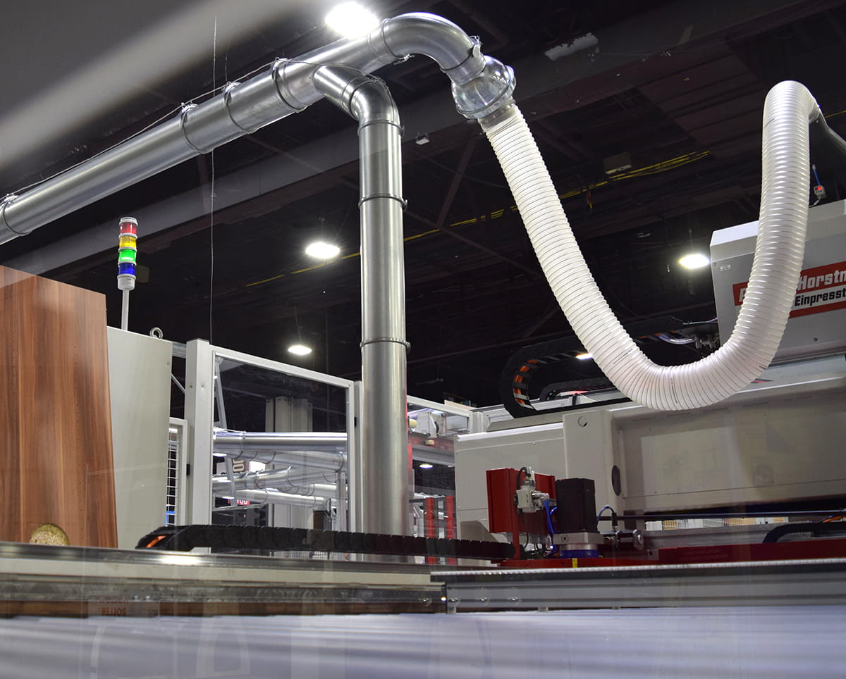 Nordfab QF Ball Joint installed on duct line from woodworking machinery